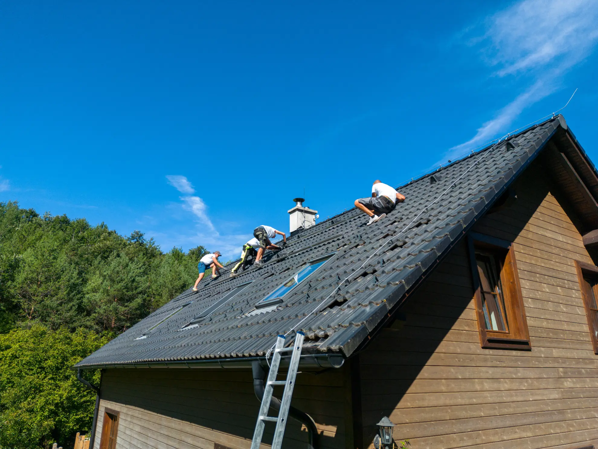 Roofing crew working on a new roof installation in Connecticut